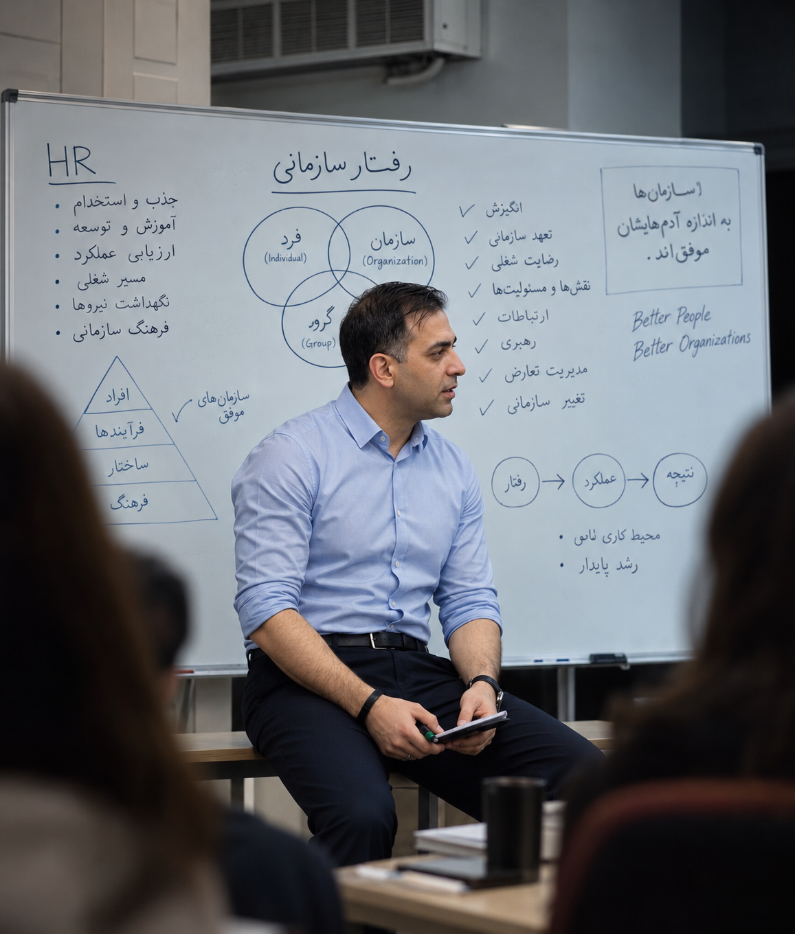 Aidin Faridnejad speaking at a professional event